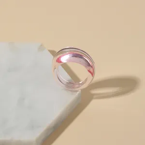 Trendy transparent pink acrylic resin chunky ring, minimalist geometric design detail.