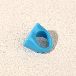 Blue acrylic heart ring for women, minimalist chunky resin finger jewelry fashion.