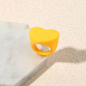 Yellow acrylic heart ring minimalist fashion chunky finger jewelry detail display view
