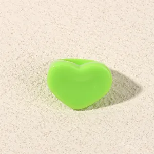 Green heart acrylic ring detail shot, minimalist fashion resin ring for women daily wear.
