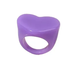 Stylish purple acrylic heart ring for women, trendy chunky resin statement jewelry piece.
