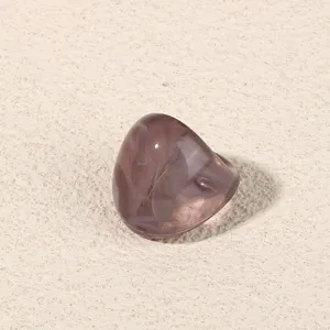 Detailed shot of a stylish chunky translucent purple acrylic geometric ring for women.