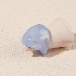 Minimalist translucent blue acrylic ring close-up, stylish geometric design for women daily wear.