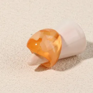 Orange resin chunky ring detail shot, minimalist geometric acrylic fashion jewelry for women.