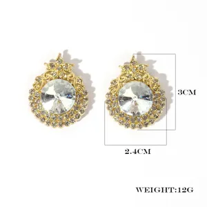 Detailed view of vintage crystal rhinestone stud earrings showing exact dimensions and weight.