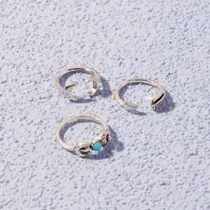 Vintage silver ring set featuring moon, arrow, and blue stone designs for daily wear.