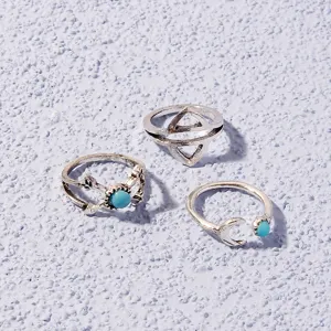 Retro silver-plated ring set featuring geometric triangle, arrow and moon designs with turquoise.