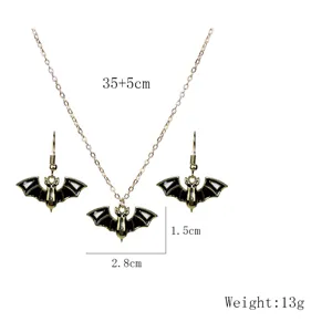 Gothic bat pendant necklace and earrings jewelry set with black enamel details for women.