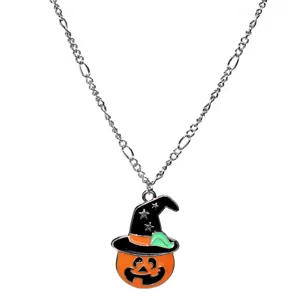 Halloween pumpkin witch hat necklace detail, silver chain with cute enamel pendant.