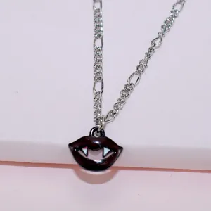 Gothic vampire lips pendant necklace with silver chain, trendy Halloween spooky jewelry gift.