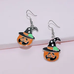 Halloween pumpkin witch hat drop earrings detail view, cute alloy festival jewelry.
