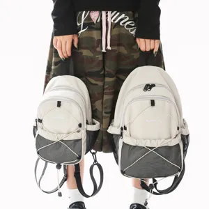 Lässiger Nylon-Rucksack mit Front-Netztasche und Kordelzug, stilvoller Alltags-Tagesrucksack.