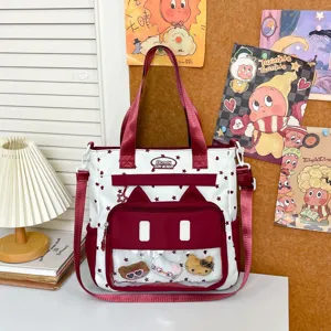 Grand sac cabas en toile avec poche oreilles de chat, imprimé étoiles et bandoulière réglable.