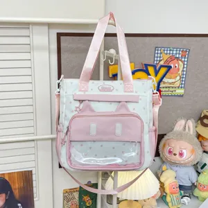 Sac cabas en toile rose avec oreilles de chat, fenêtre transparente et motif d'étoiles.