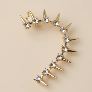 Gouden punk spike oorklep met sprankelende klare strass steentjes modieuze sieraad accessoire