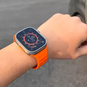 Vibrant orange silicone sports watch strap replacement compatible with smart watch models.