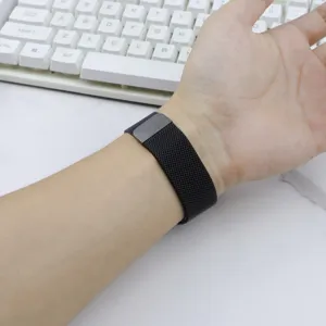 Detailed close-up view of the black metal mesh Milanese watch strap with magnetic clasp.