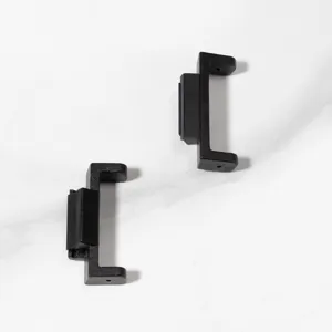 Detailed view of black watch strap conversion connectors, ideal for custom modification upgrades.