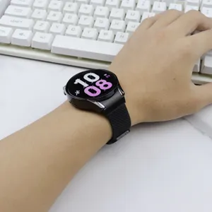 Close-up detail of black metal Milanese magnetic watch strap and protective case worn on wrist.