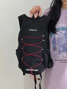 Sac à dos de randonnée extérieur léger noir avec cordons élastiques rouges pour voyage et sport