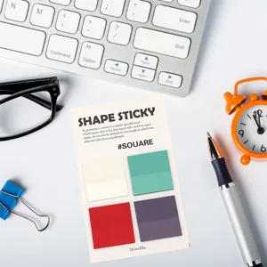 Translucent PET sticky notes in four colors with desk props, ideal for office and study use.