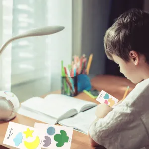 Transparent PET sticky notes showing cute shapes and bright colors in daily study scene.