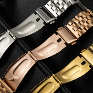 Stainless steel watch band detail shot, showcasing 5-bead links and folding clasp.