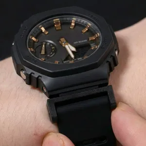Close-up detail shot of black watch modification connector strap adapter mounted on timepiece.
