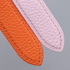 Litchi grain leather watch strap replacement for smart watches in orange and pink.