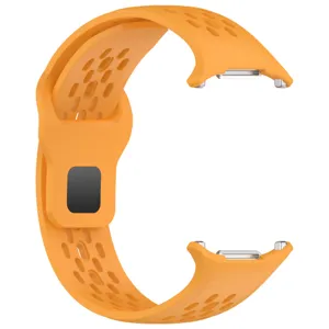 Orange silicone replacement watch strap with breathable perforated design for use