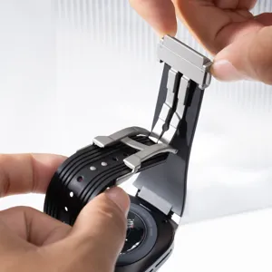 Detail view of silicone watch strap with stainless steel folding clasp for smartwatch.