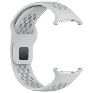 Detailed view of grey silicone perforated replacement watch strap, breathable sports band.