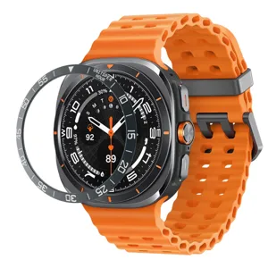 Anneau de lunette en métal de 47mm pour Samsung Galaxy Watch Ultra et bracelet en silicone orange.