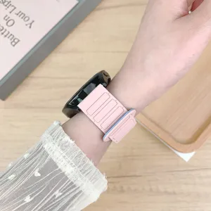 Silicone magnetic loop watch band detail view, two-tone flexible strap for daily wear.