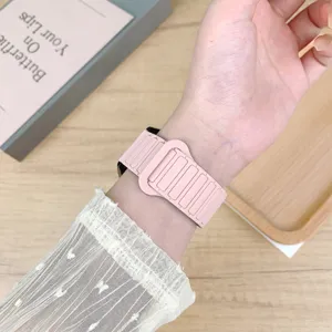 Pink silicone watch band detail shot, replacement strap for smartwatch, comfortable and soft.