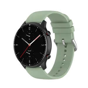 Detailed close-up of a smartwatch featuring a soft mint green silicone strap and silver buckle.