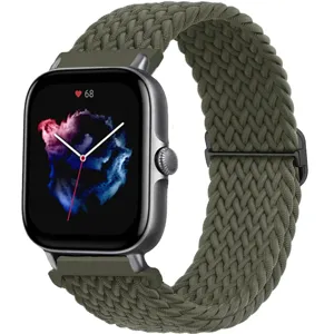 Detailed view of smartwatch with olive green braided nylon loop strap and adjustable buckle.