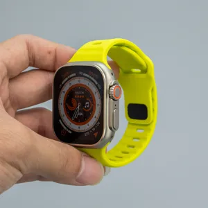 Bright yellow silicone sports watch band compatible with smartwatches, durable and comfortable.