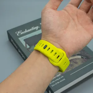Silicone sports watch band detail view, bright yellow color, comfortable wrist wear fit.