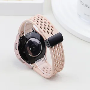 Pink silicone perforated watch strap and PC hollow case set for smartwatch, stylish and durable.
