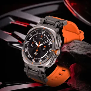 Detail view of rugged orange silicone watch band featuring metal end links and sport design.