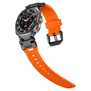 Orange TPU silicone watch strap detail view, featuring metal connectors and robust pin buckle.