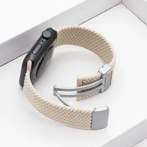 Cinturino per orologio in nylon intrecciato con fibbia deployante in metallo, beige.