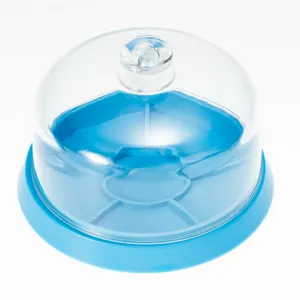 Copertura antipolvere in plastica trasparente con base blu per strumenti di riparazione.