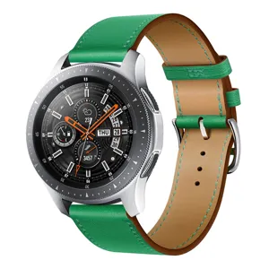 Green PU leather watch strap replacement with silver case and classic dial design.