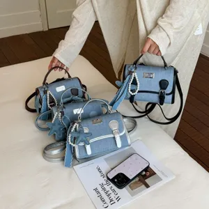 Borsa a mano in denim da donna con ciondolo stella di perla, perfetta per ogni occasione.