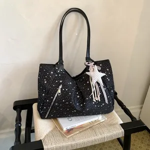 Black star print tote bag, stylish shoulder bag with front zipper pocket and charm.