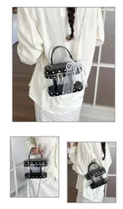 Bonito bolso bandolera transparente de lunares con lazo de encaje y cadena metálica.