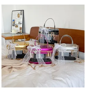 Bolso bandolera de caja transparente con lazo de encaje y cadena para mujer moda verano