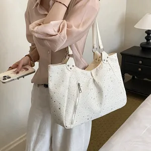 Stylish commuter shoulder tote bag with chic star pattern for women daily fashion use.